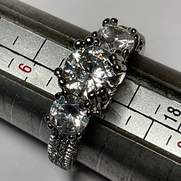 Sterling Silver Ring with clear stones. Size 7 - Picture 1 of 6